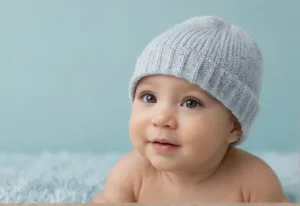 Retrato de um bebê sorridente chamado Pietro